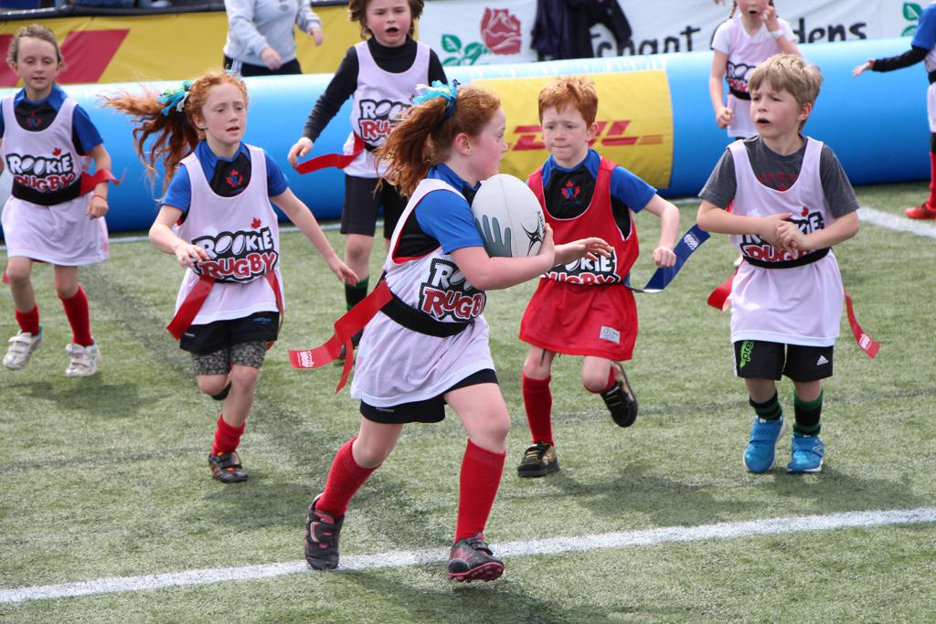 Girl playing youth rugby